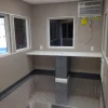 PaulReillyCo-8x12FaureciaGuardhouse-Completion2-1.webp 8×16 Guard Booth-PlanA